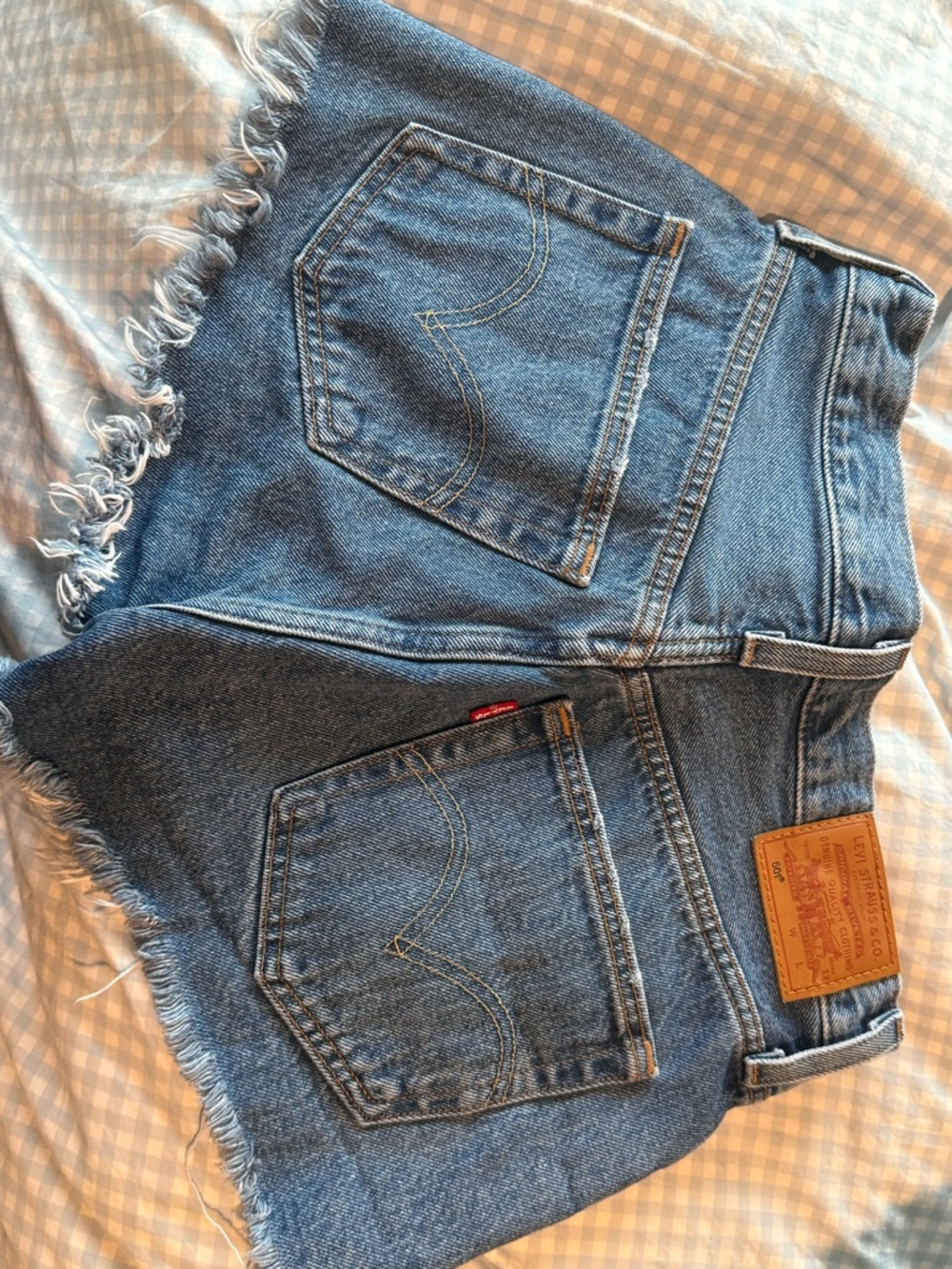 Levi's Medium Blue Denim Cutoff Shorts with Frayed Hem